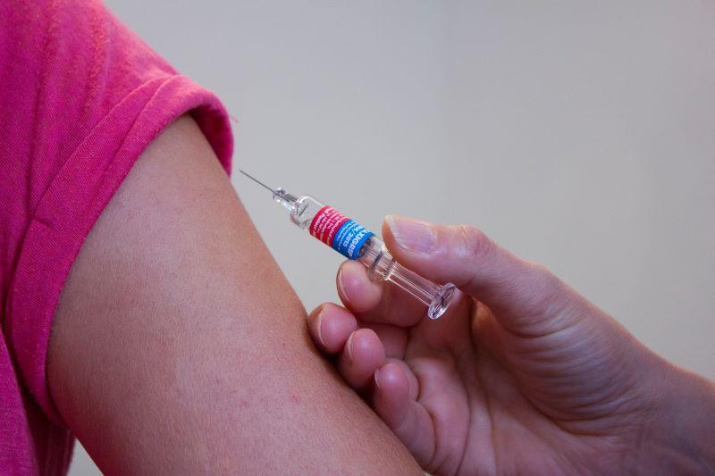 Person receiving a vaccine in their arm
