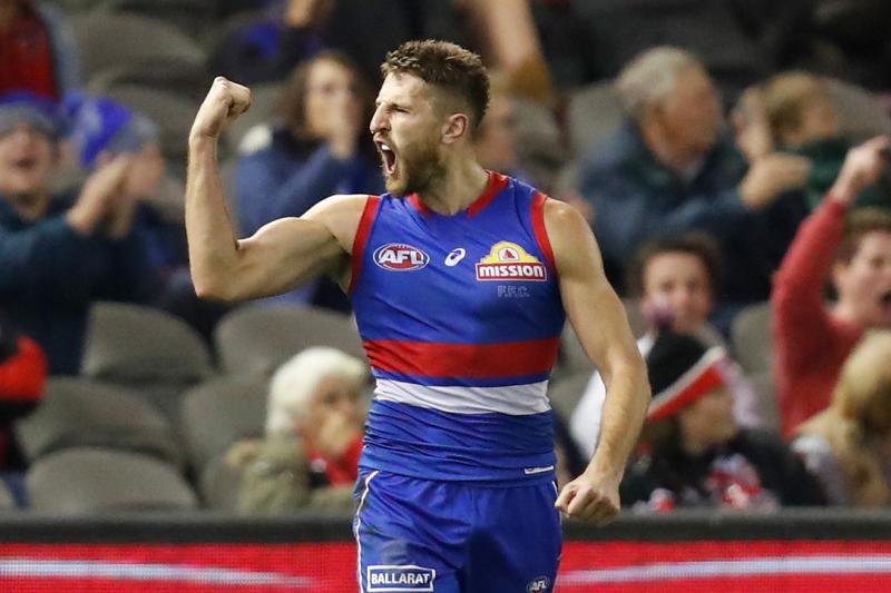  Western Bulldogs Captain Marcus Bontempelli raises his fist in celebration
