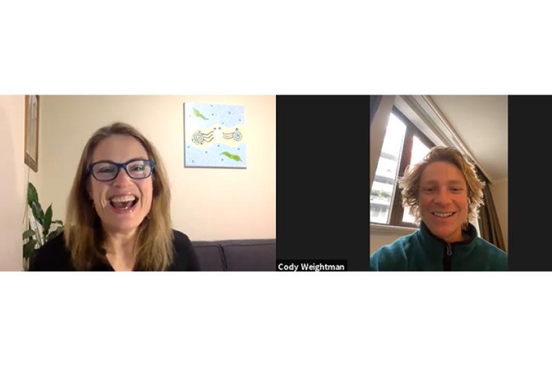 Woman and young man on Zoom call, laughing; Professor Alex Parker  on a Zoom call with Western Bulldogs star and VU student Cody Weightman.