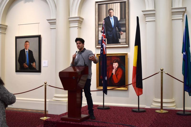  Photo of high school student at lectern at Parliament house 