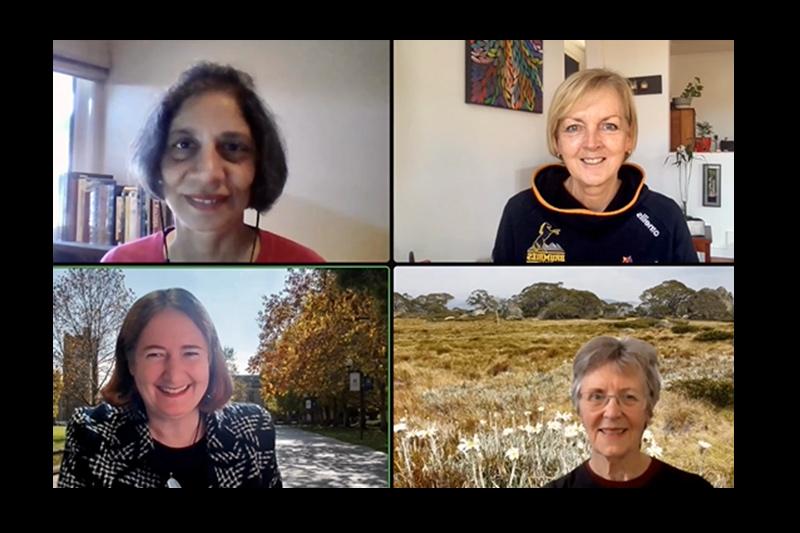 Four middle aged women collaborate in an online meeting