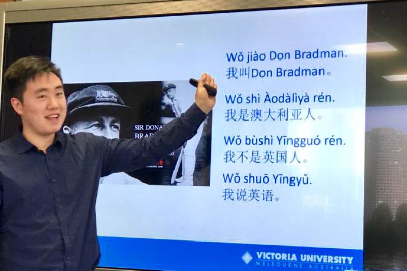 A teacher giving a Chinese Mandarin class.