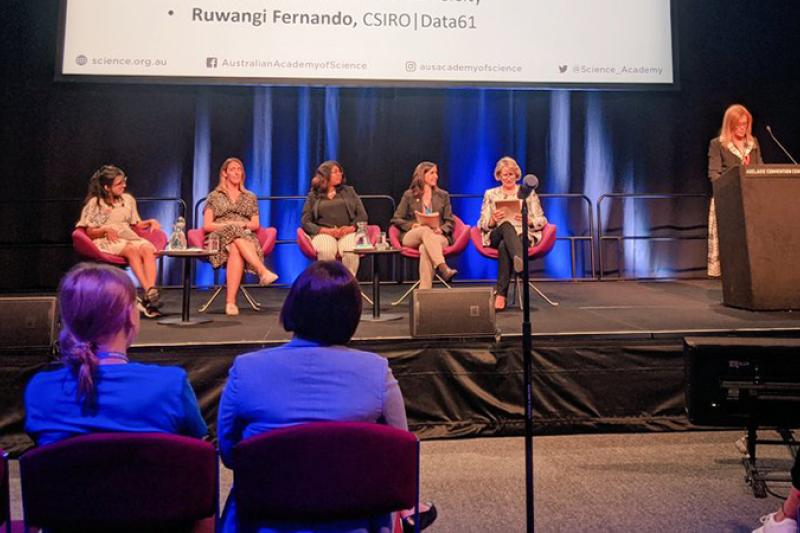 Panel of women on stage