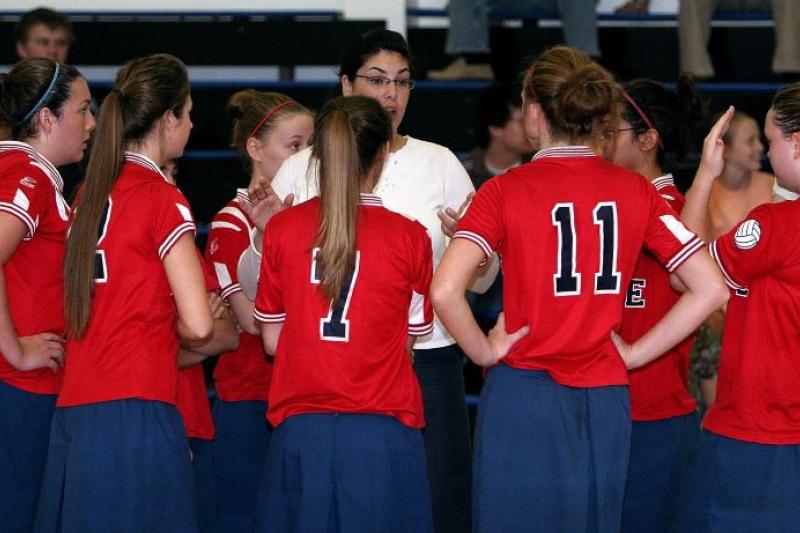 Girls volleyball team with coach