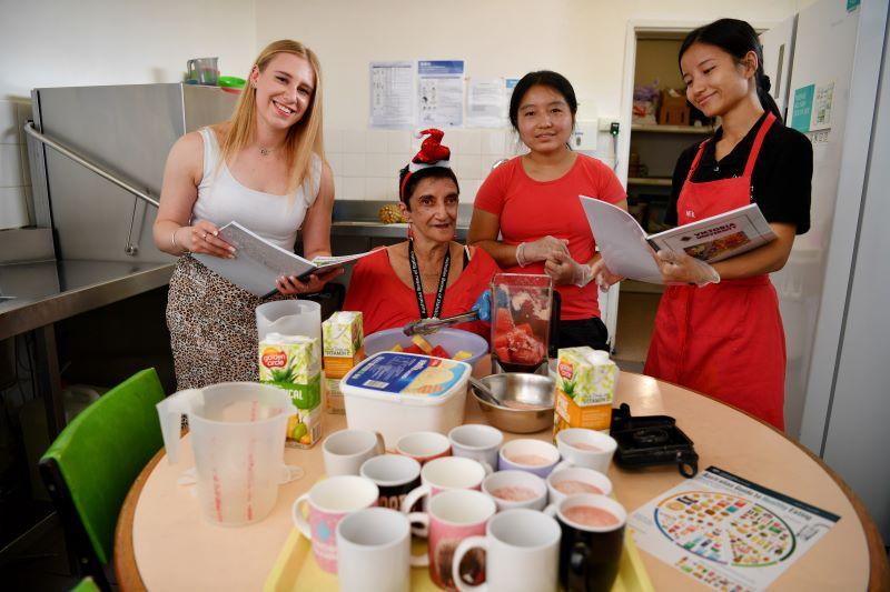  Nutrition student with client and staff from Footscray House