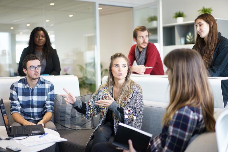 Diverse group of young men and women in a workplace setting