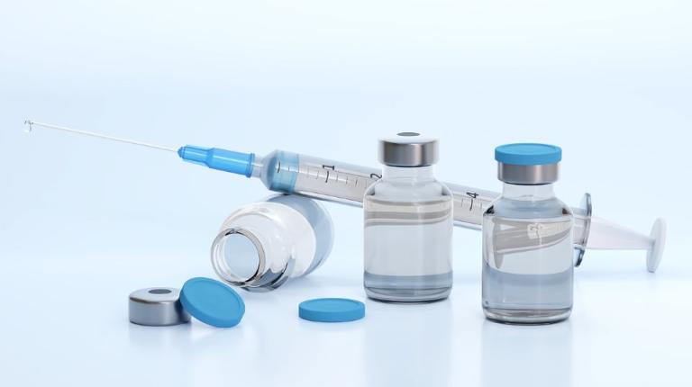 I need a flu shot & a COVID booster. Can I get them at the same time?