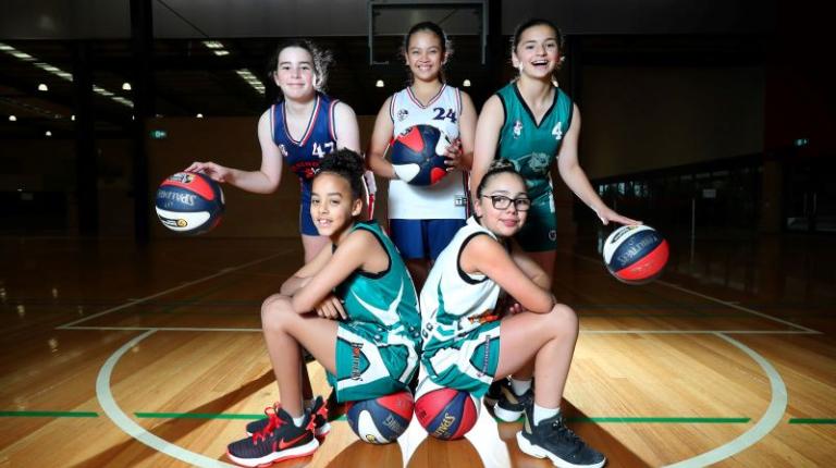 Women & girls kick goals in 'male' sports
