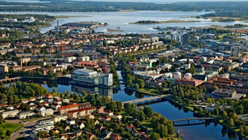 aerial photo of the picturesque town of Karlstad, with a river running through it.