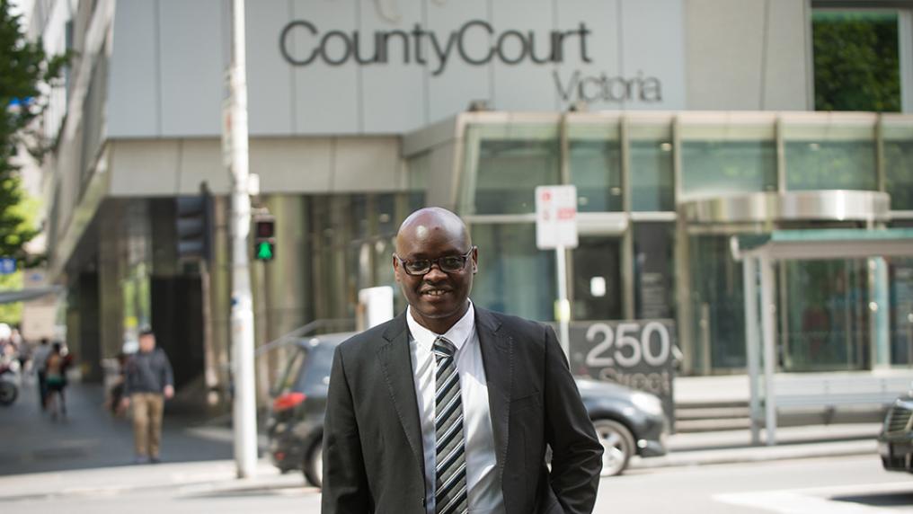 Innocent Karabagega outside the County Court Victoria