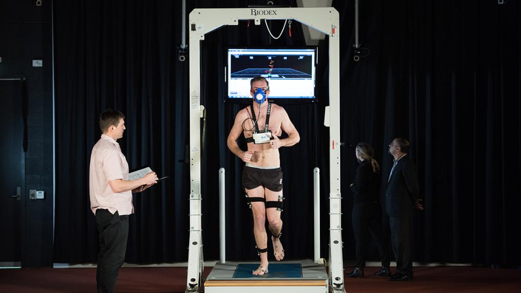 Man runs on sophisticated exercise monitoring equipment