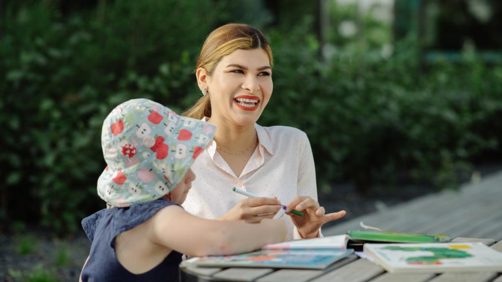 A VU Polytechnic early childhood student works with a child.