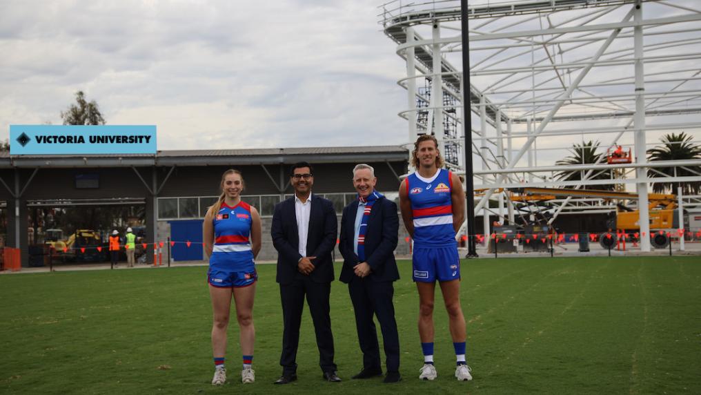 Western Bulldogs players and CEO with VU Vice-Chancellor at Whitten Oval
