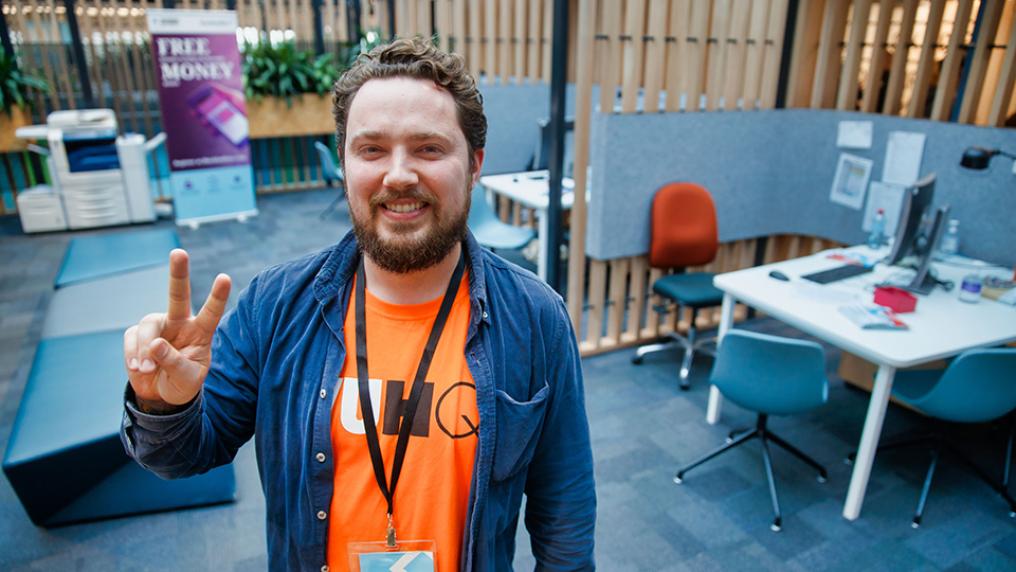 Staff member posing outside VUHQ Footscray Park Campus