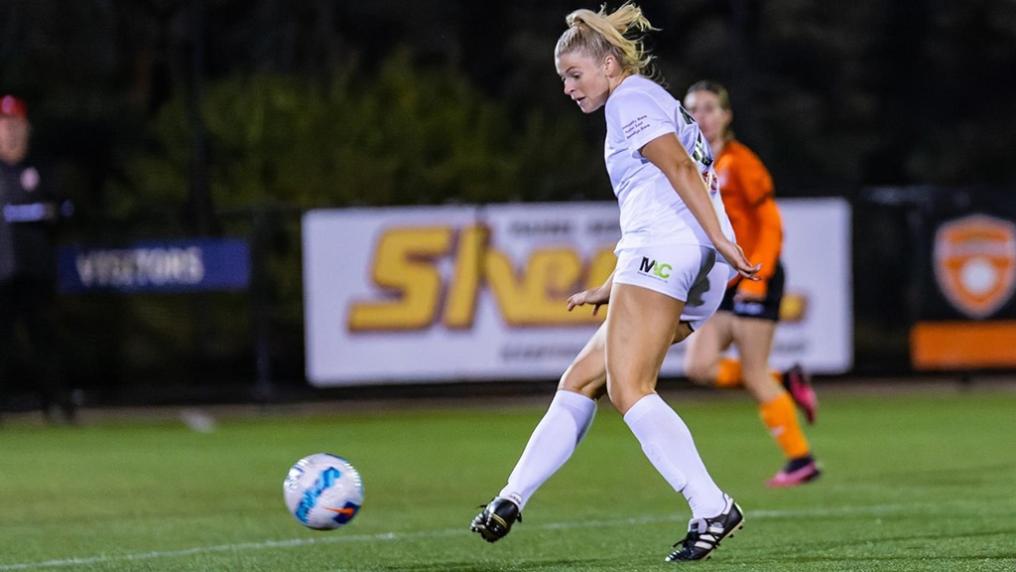 Woman playing soccer