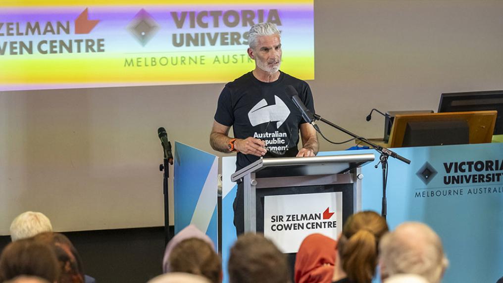 Craig Foster presenting at Sir Zelman Cowen Centre, with a capacity audience