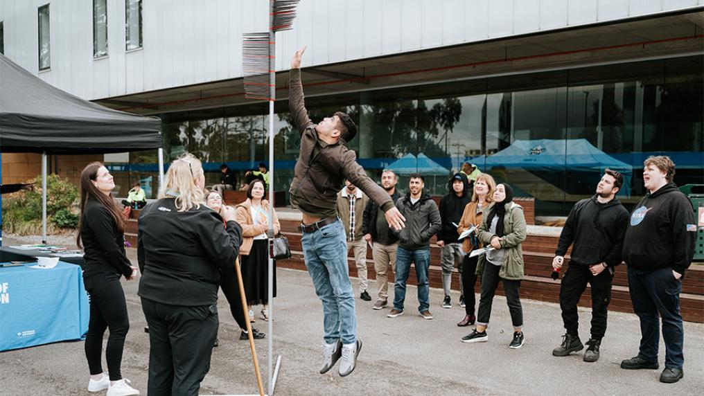 Student attempting the jump test on a VU campus.