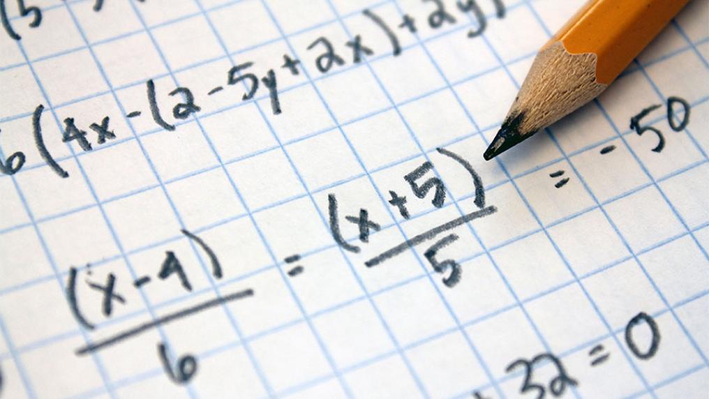 Algebra written out with pencil.