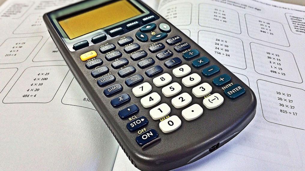 A calculator on a math textbook