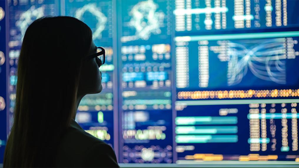 Female student looking at data