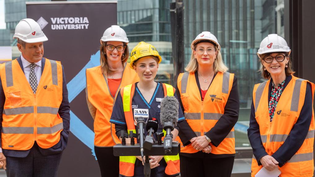 People standing at a press conference at Footscray Hospital construction site