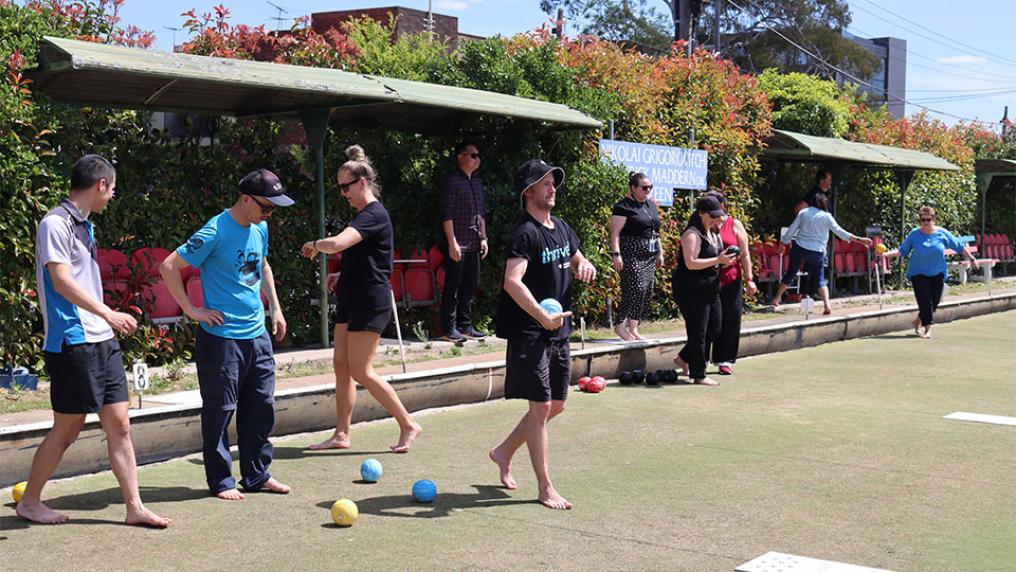 thrive* participants playing barefoot balls.