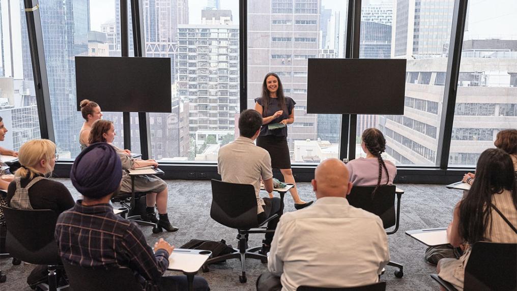 Students learning in a classroom at City Tower.