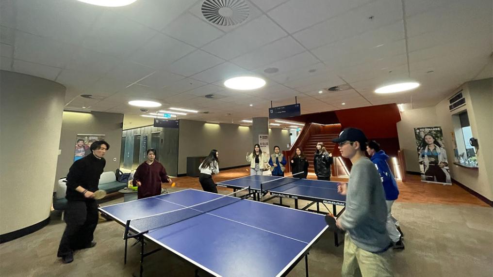 VU students playing table tennis.