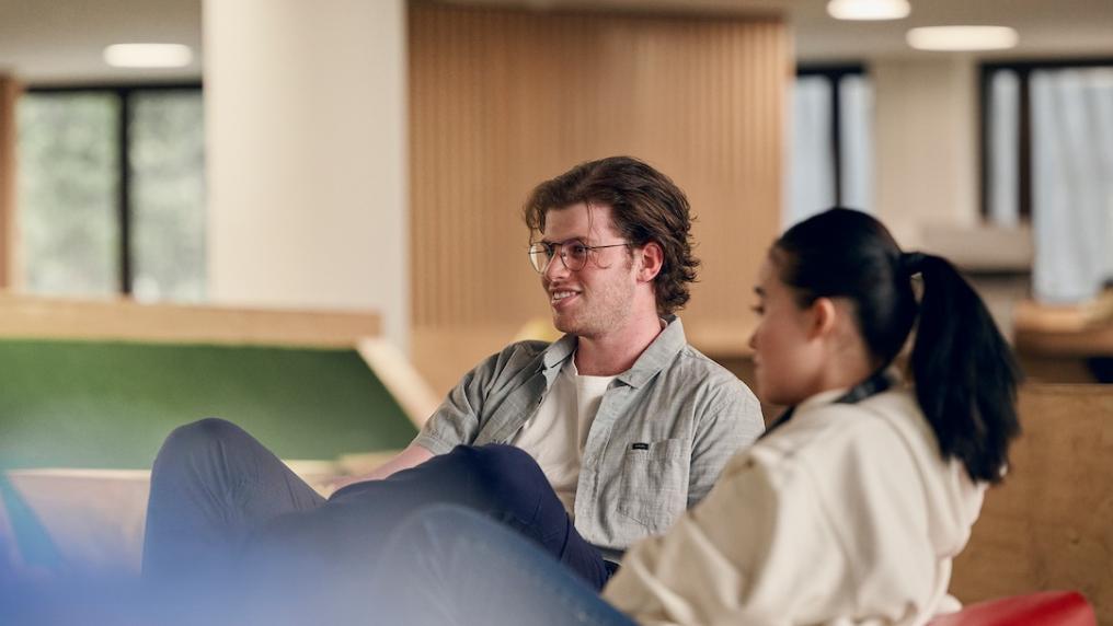 VU students relax together in a study space.