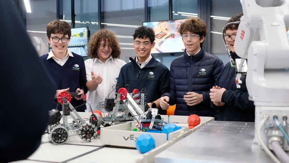 High school students doing robotics activity at Wyndham Tech School