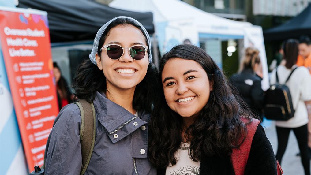 Two students smiling at the VU Enrolment Carnival.