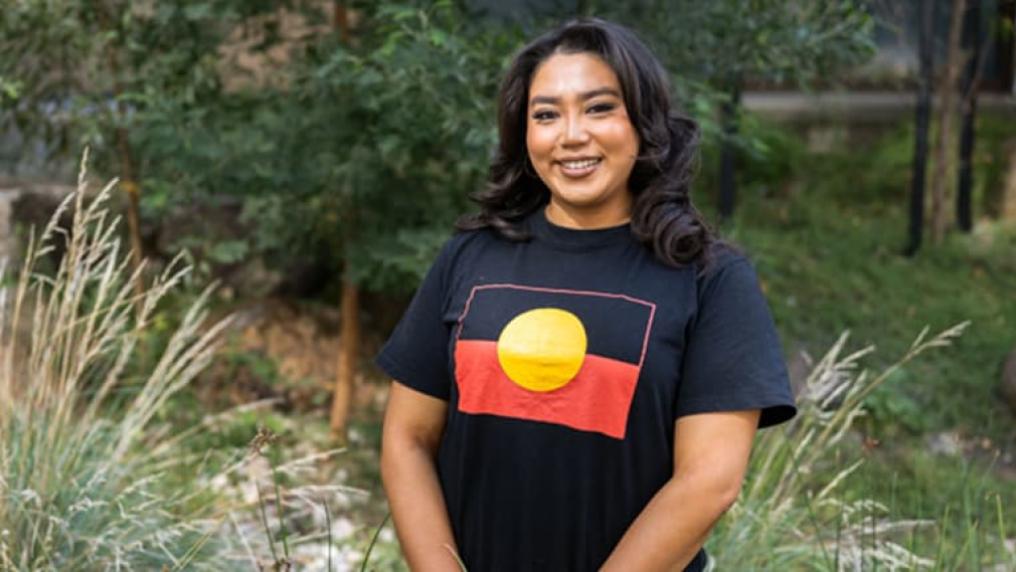 VU student standing outdoors and smiling on Footscray Park campus