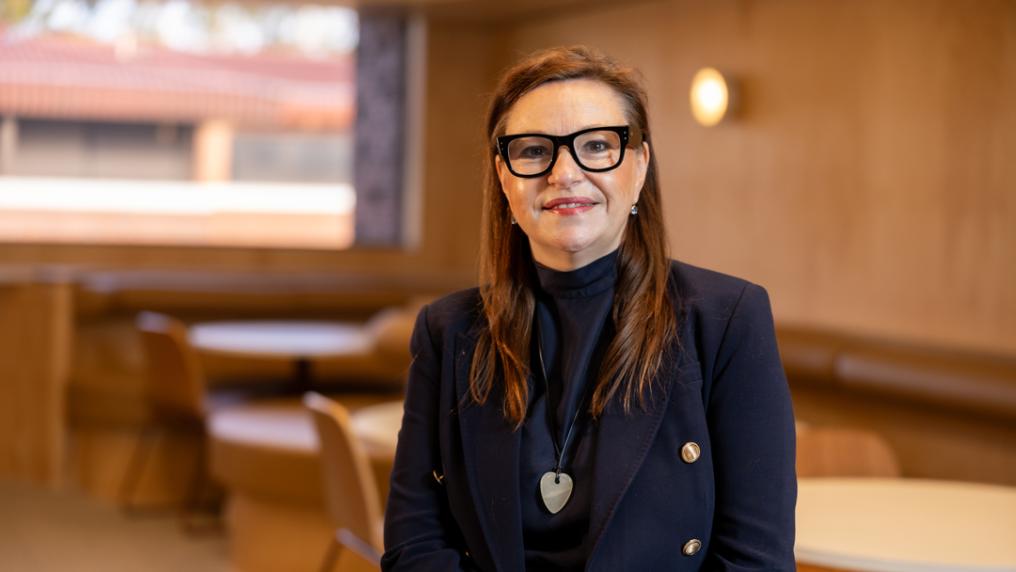 Professional looking woman smiles at the camera