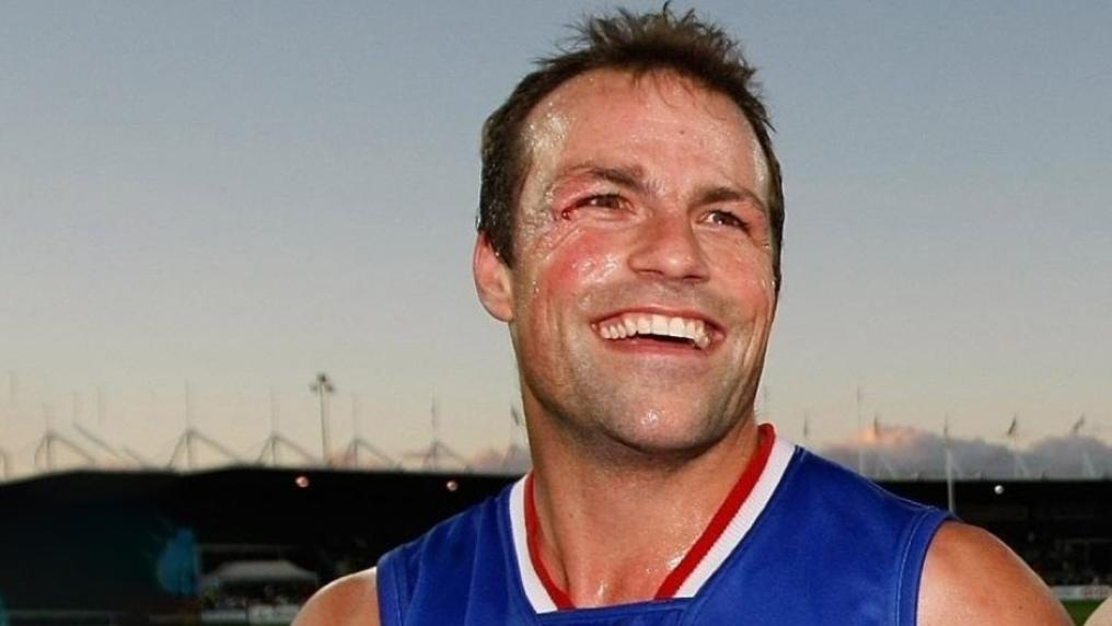 Smiling male football player 