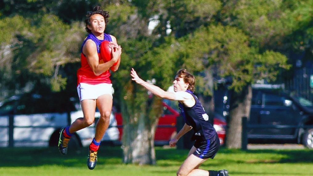 Bachelor of Fitness student Callum Harrison playing AFL