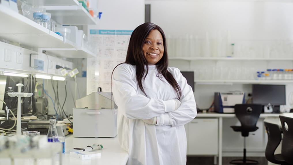Damilola Omotosho in a lab
