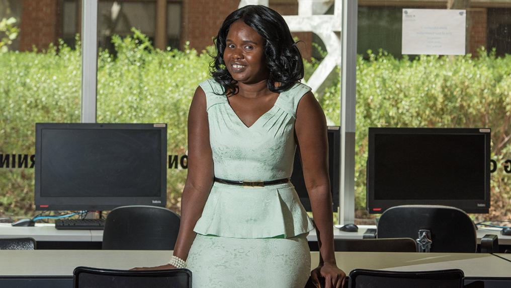 Young woman in profession clothes in computer lab