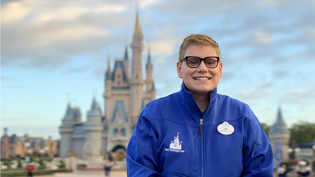 Tim McCann in front of a Disney castle